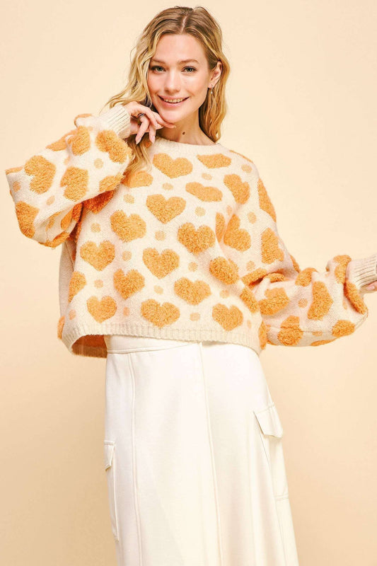 THE HEART KNIT SWEATER